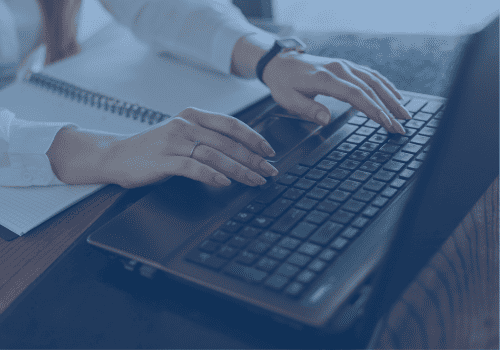 person working on a laptop computer